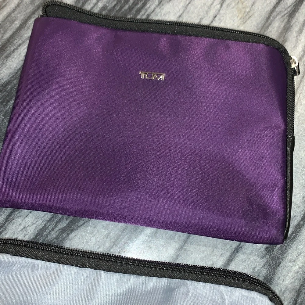 Tumi Purple and Gray Travel Pouches with Socks and sleep masks